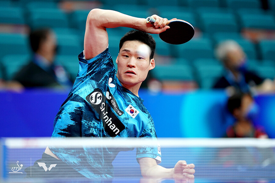 ▲ 2022 단체전 세계탁구선수권대회서 경기를 펼치는 장우진 ⓒ국제탁구연맹(ITTF)