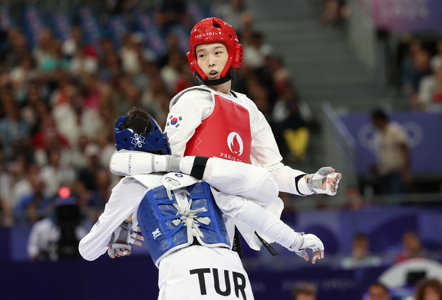▲ 8일(현지시간) 프랑스 파리 그랑팔레 태권도경기장에서 열린 2024 파리올림픽 태권도 여자 57kg급에서 김유진이 세계랭킹 5위를 시작으로 4위, 1위, 2위를 차례차례 꺾으면서 금메달을 차지했다. 세계태권도연맹(WT) 상위 랭커가 아니어서 금메달 가능성을 높게 보지 않았던 김유진인데 상위 랭커를 모두 제압하는 자이언트 킬링을 달성하며 이 체급 16년 만의 금메달 주인공이 됐다.. ⓒ 연합뉴스