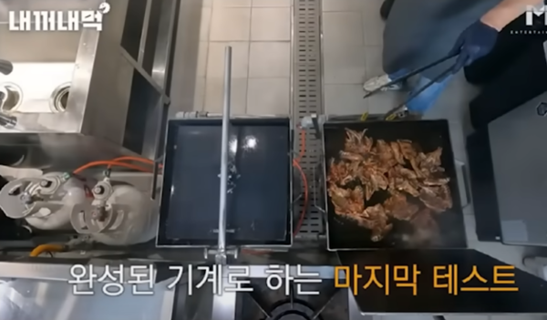 ▲ 백종원이 가스통 옆에서 튀김 요리를 하는 모습이 담긴 영상. 출처|백종원 유튜브