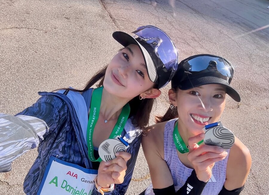 뉴진스 다니엘, 전속계약 소송 패소 후 근황…마라톤 완주에 밝은 미소 포착