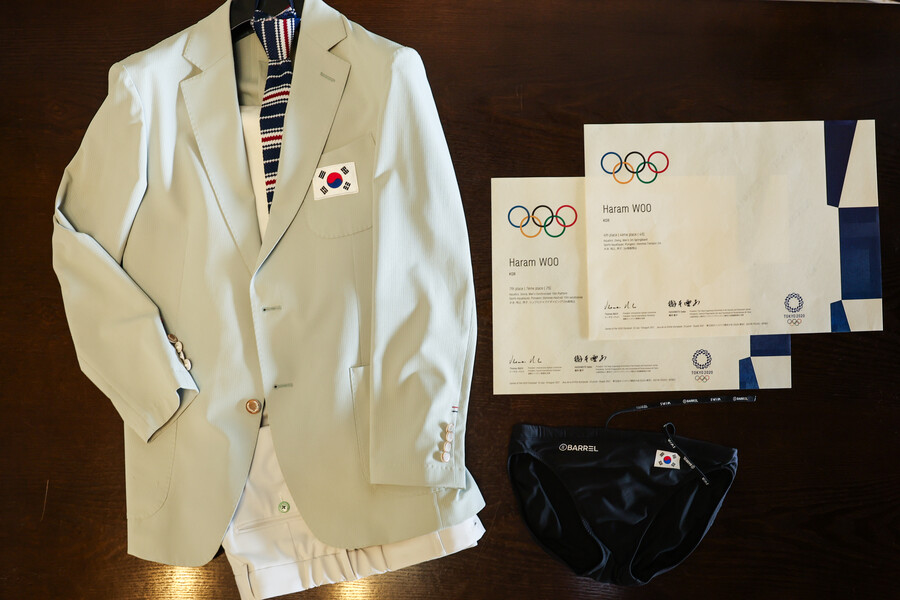 ▲ 한국 다이빙의 역사 우하람이 국립스포츠박물관에 2020 도쿄 올림픽 남자 스프링보드 4위 상장 등 역사가 담긴 용품을 기증했다.  ⓒ국민체육진흥공단