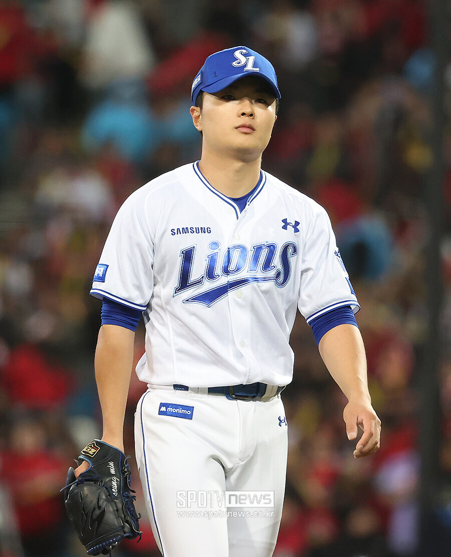 [포토S] 더그아웃 향하는 이승민